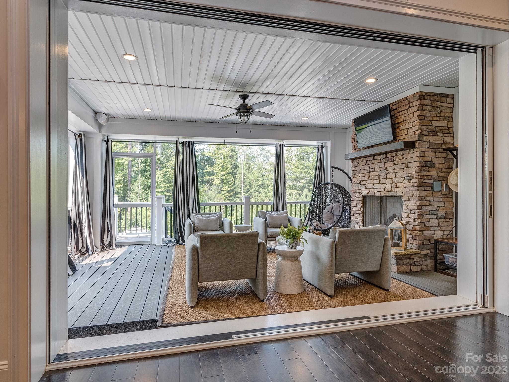411 Turtleback Ridge Weddington, NC 28104 - Photo 21 of 48 a view of a dining room with furniture wooden floor and fan