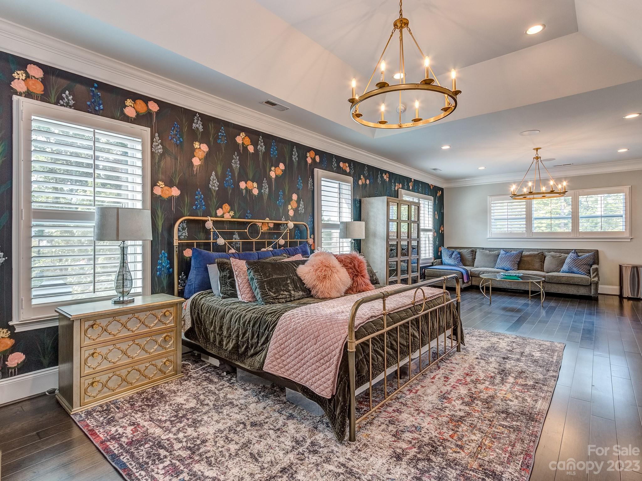 411 Turtleback Ridge Weddington, NC 28104 - Photo 24 of 48 a living room with furniture a chandelier and a table