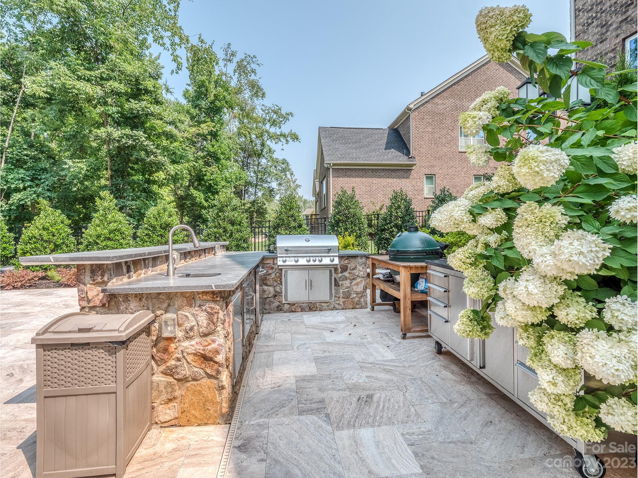 411 Turtleback Ridge Weddington, NC 28104 - Photo 42 of 48 a balcony with furniture and flowers
