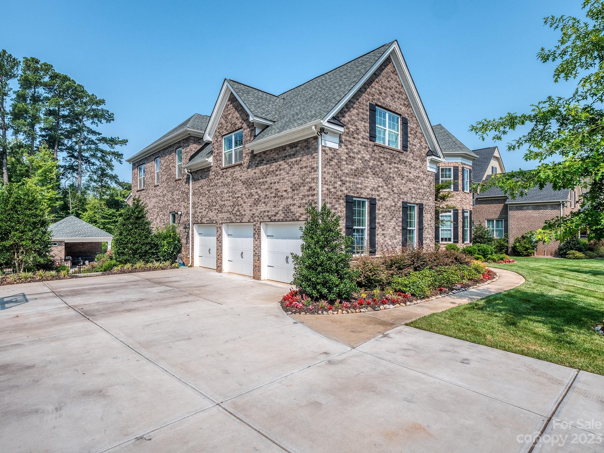 411 Turtleback Ridge Weddington, NC 28104 - Photo 44 of 48 a front view of a house with a yard and trees