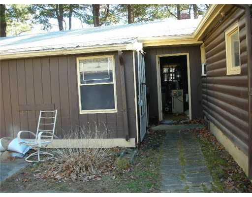 57 Isle Of Capri Road Coventry, RI 02816 - Photo 2 of 10 Exterior Front. Right Side View (Mechanicals)