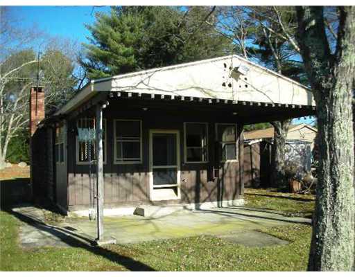 57 Isle Of Capri Road Coventry, RI 02816 - Photo 3 of 10 Exterior Back. With Patio