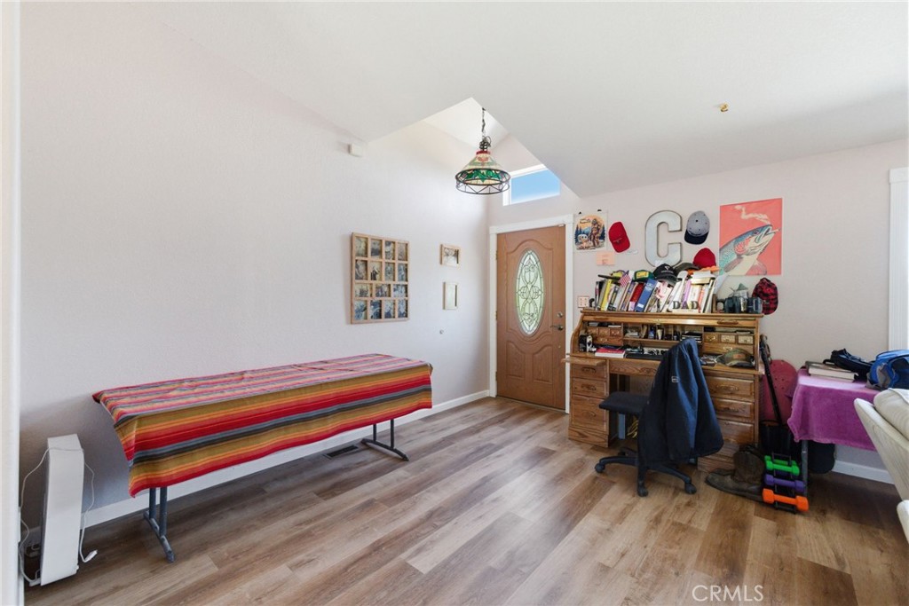 21552 Sprague Road West Groveland, CA 95321 - Photo 4 of 36 a room with furniture and wooden floor