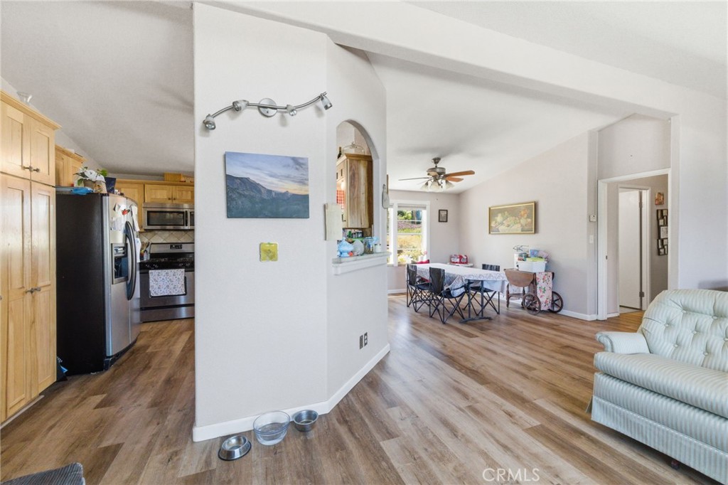 21552 Sprague Road West Groveland, CA 95321 - Photo 7 of 36 a living room with furniture and wooden floor