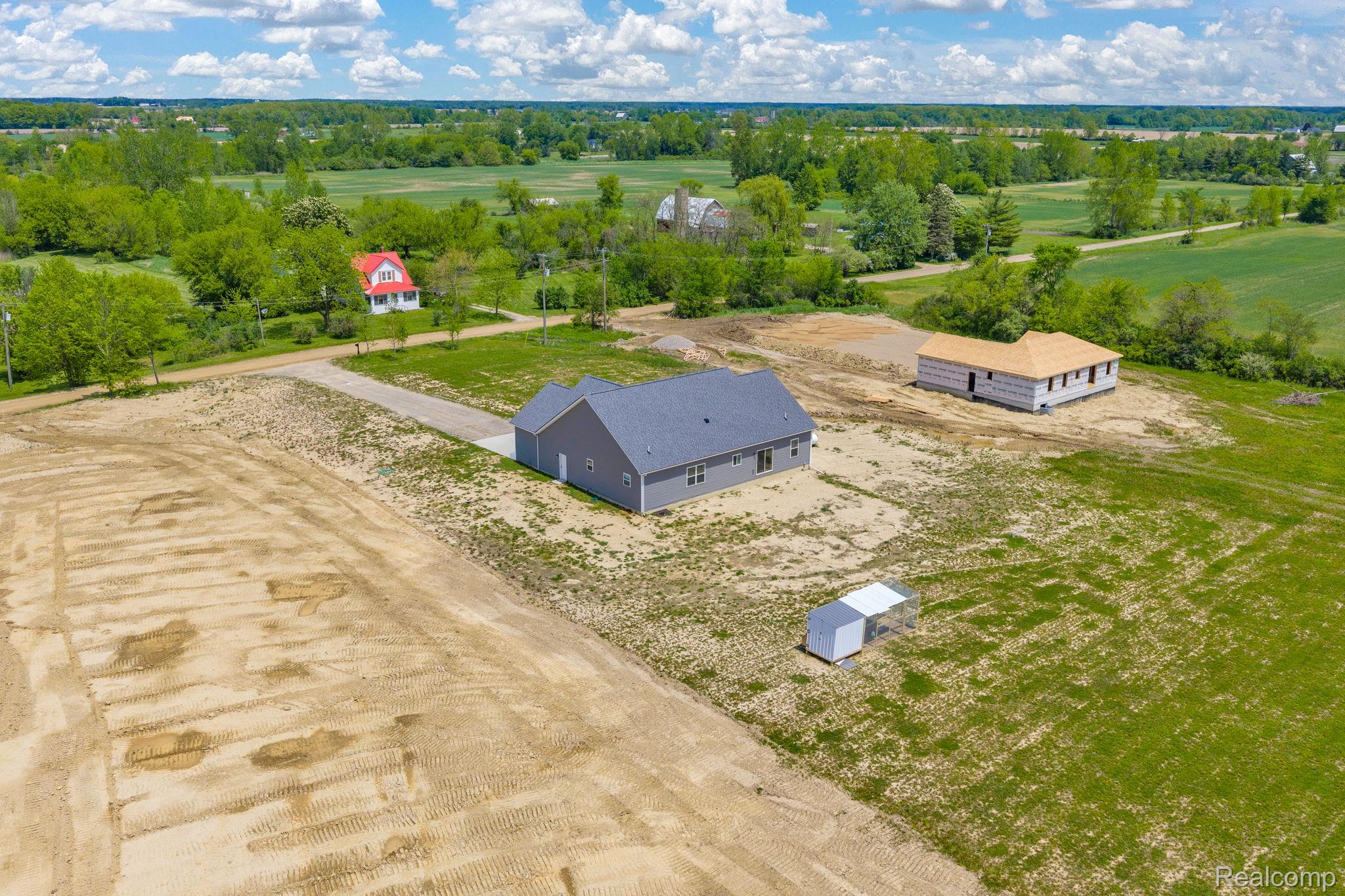 7600 Church Road Imlay City, MI 48444 - Photo 11 of 38 Newly constructed residence featuring gray siding and a dark shingle roof