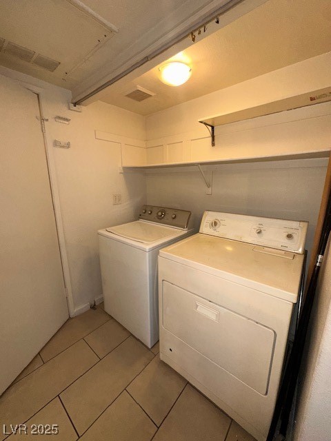 1830 North Pecos Road, Unit 155 Las Vegas, NV 89115 - Photo 16 of 23 Washroom featuring separate washer and dryer and l