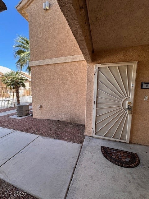 1830 North Pecos Road, Unit 155 Las Vegas, NV 89115 - Photo 4 of 23 Entrance to property featuring stucco siding and c