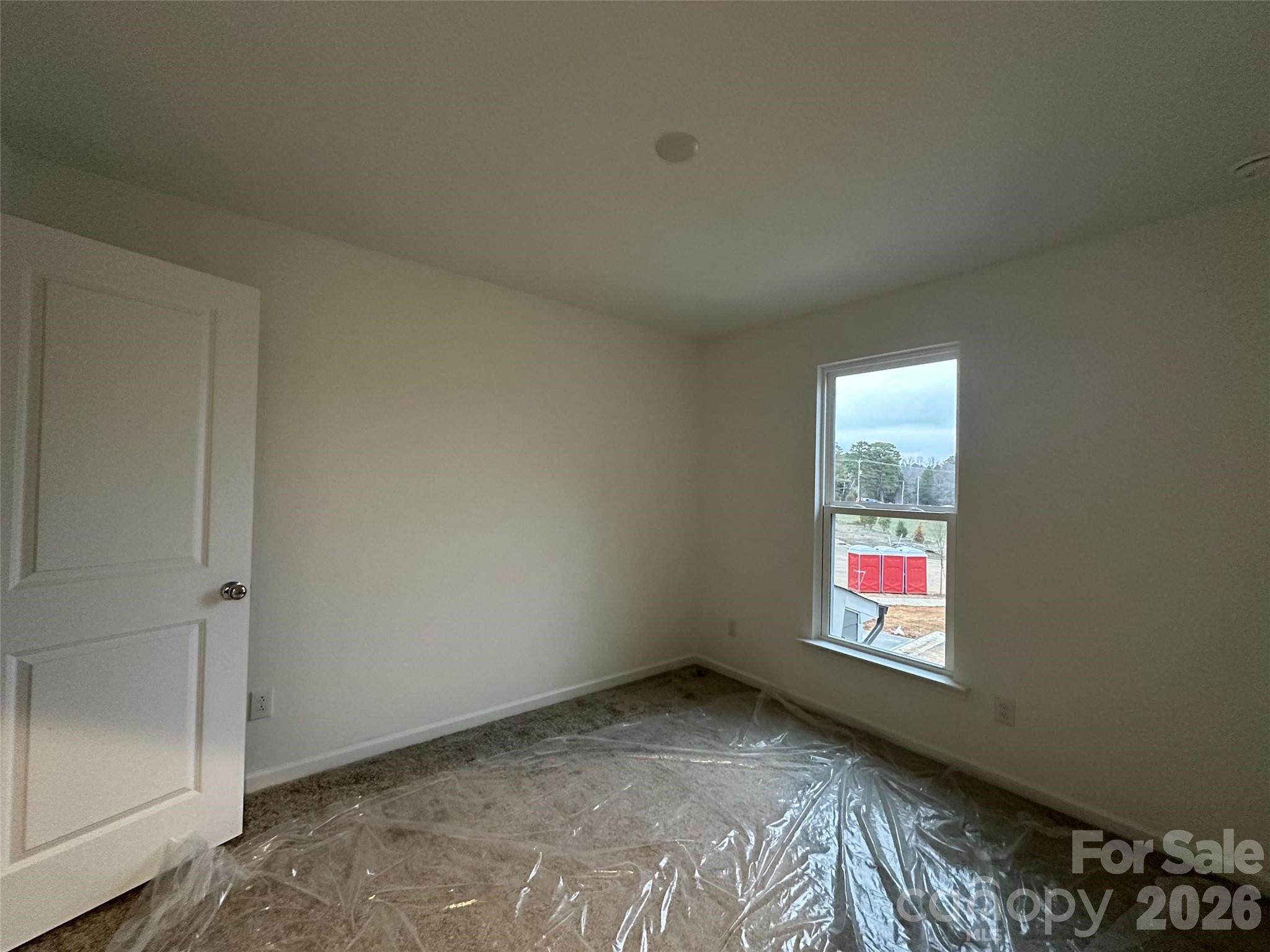1872 Teachers House Road Northwest Concord, NC 28027 - Photo 12 of 14 a view of an empty room and window