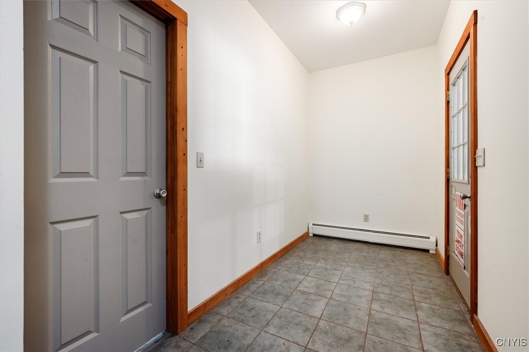 127 Long View West Webb, NY 13420 - Photo 9 of 25 Garage entry to kitchen, with space for laundry or