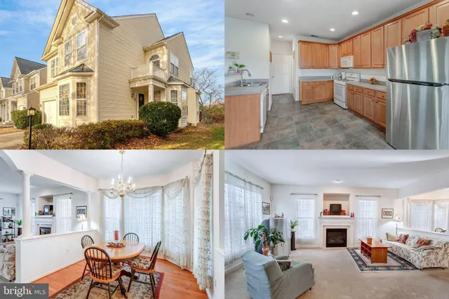 a view of living room kitchen with furniture and wooden floor