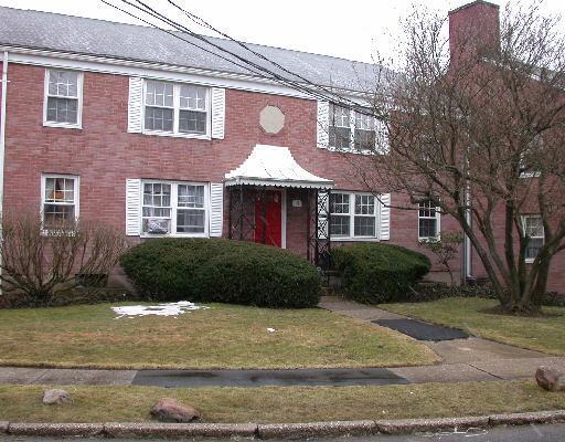57 Standish Road, Unit 3 Stamford, CT 06902 - Photo 1 of 1 a front view of a house with a yard