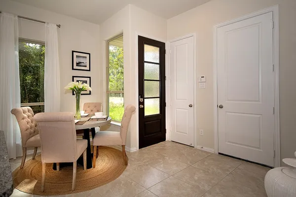 a view of a livingroom with furniture and window