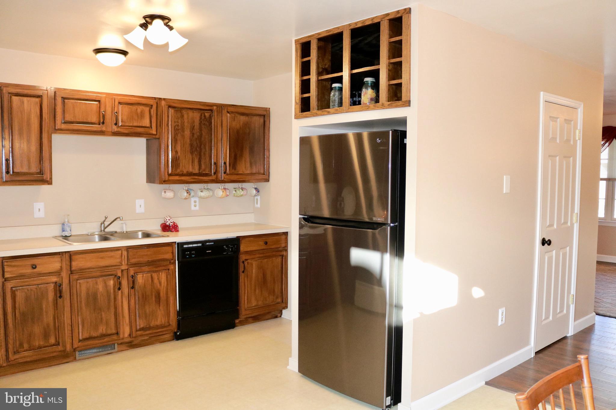 434 North Oak Street Lititz, PA 17543 - Photo 8 of 26 New stainless steel fridge.