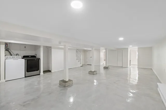 a view of empty room with windows