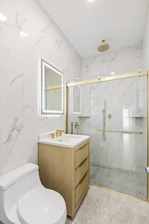 a view of a hallway with staircase