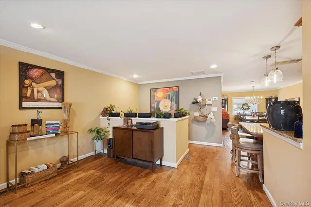 a view of a living room and dining room
