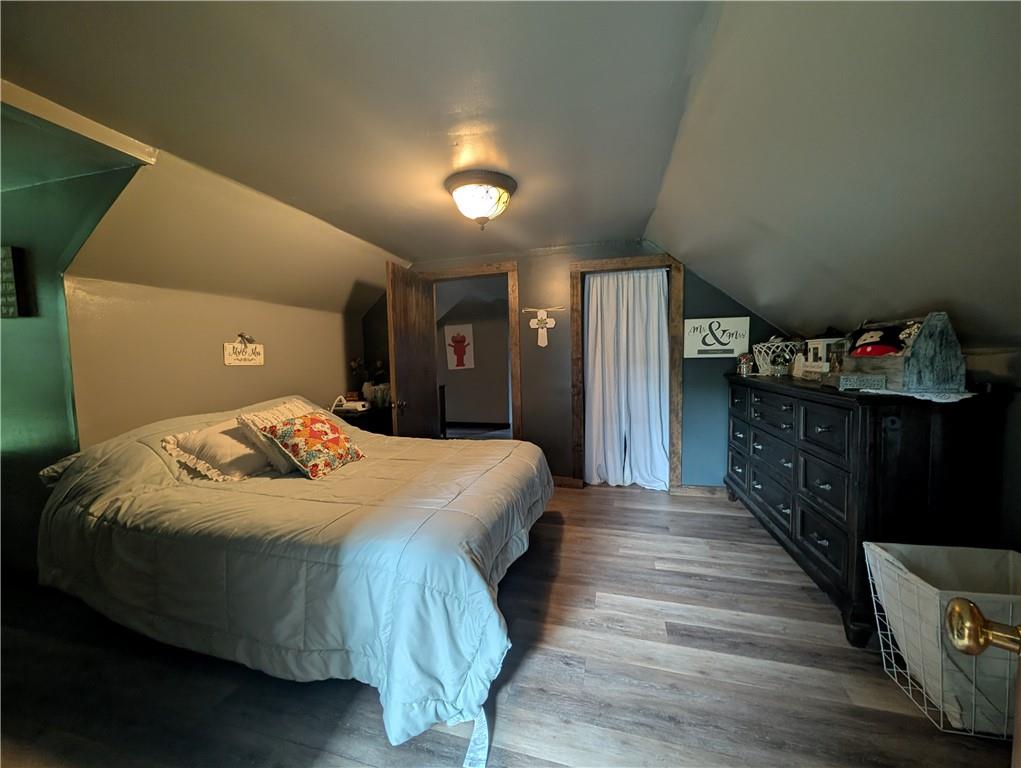 205 Woods Road Ligonier, PA 15658 - Photo 11 of 32 a bedroom with a bed and a dresser