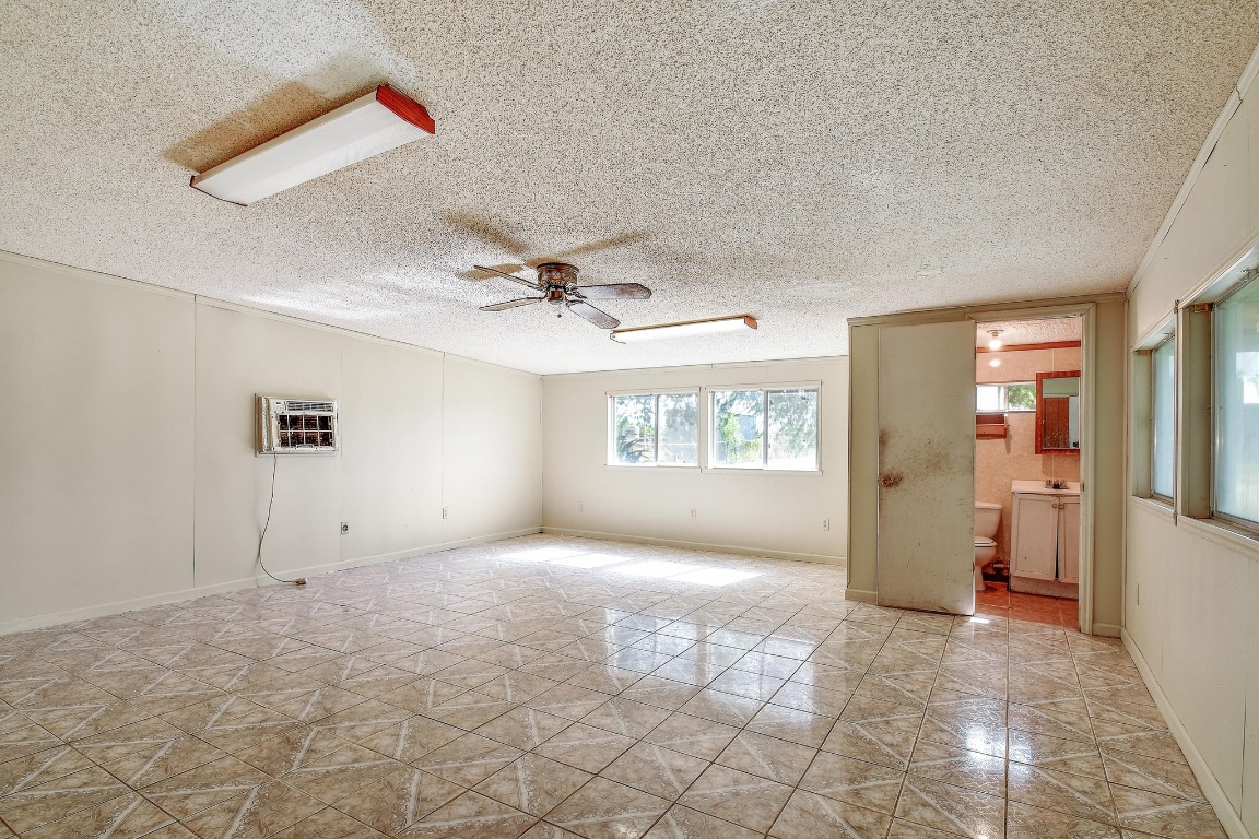 17398 Benton City Road Von Ormy, TX 78073 - Photo 20 of 25 wooden floor in an empty room
