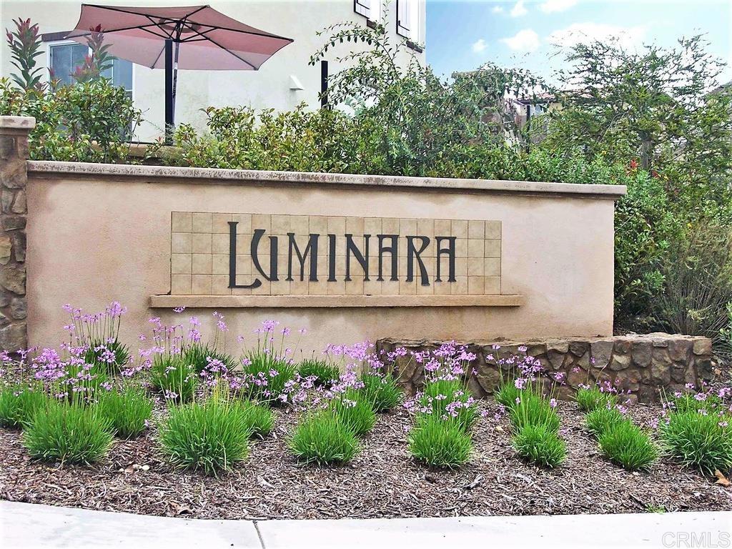 838 Luminara Way San Marcos, CA 92078 - Photo 8 of 54 a sign broad in front of flowers