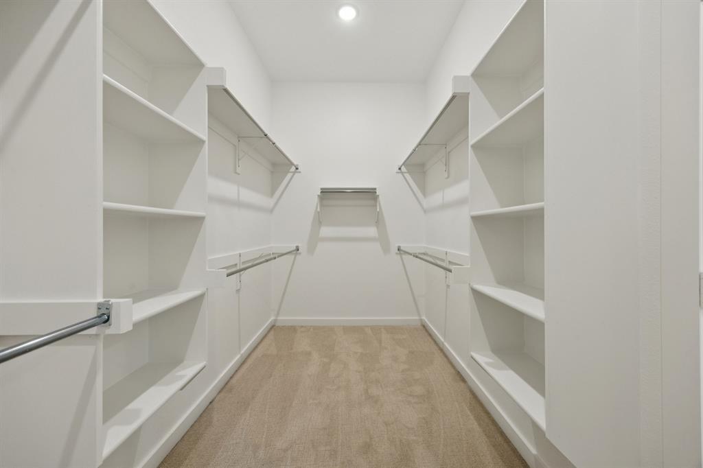 1904 Palmetto Road Celina, TX 75009 - Photo 17 of 33 Primary Closet in the Monet II home plan by Trophy Signature Homes – REPRESENTATIVE PHOTO