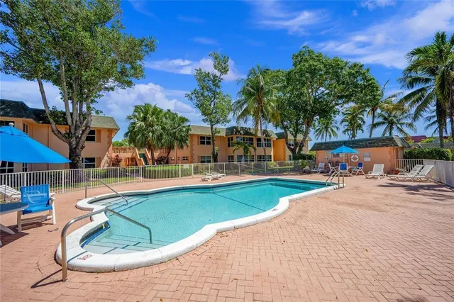 a view of outdoor space yard and swimming pool