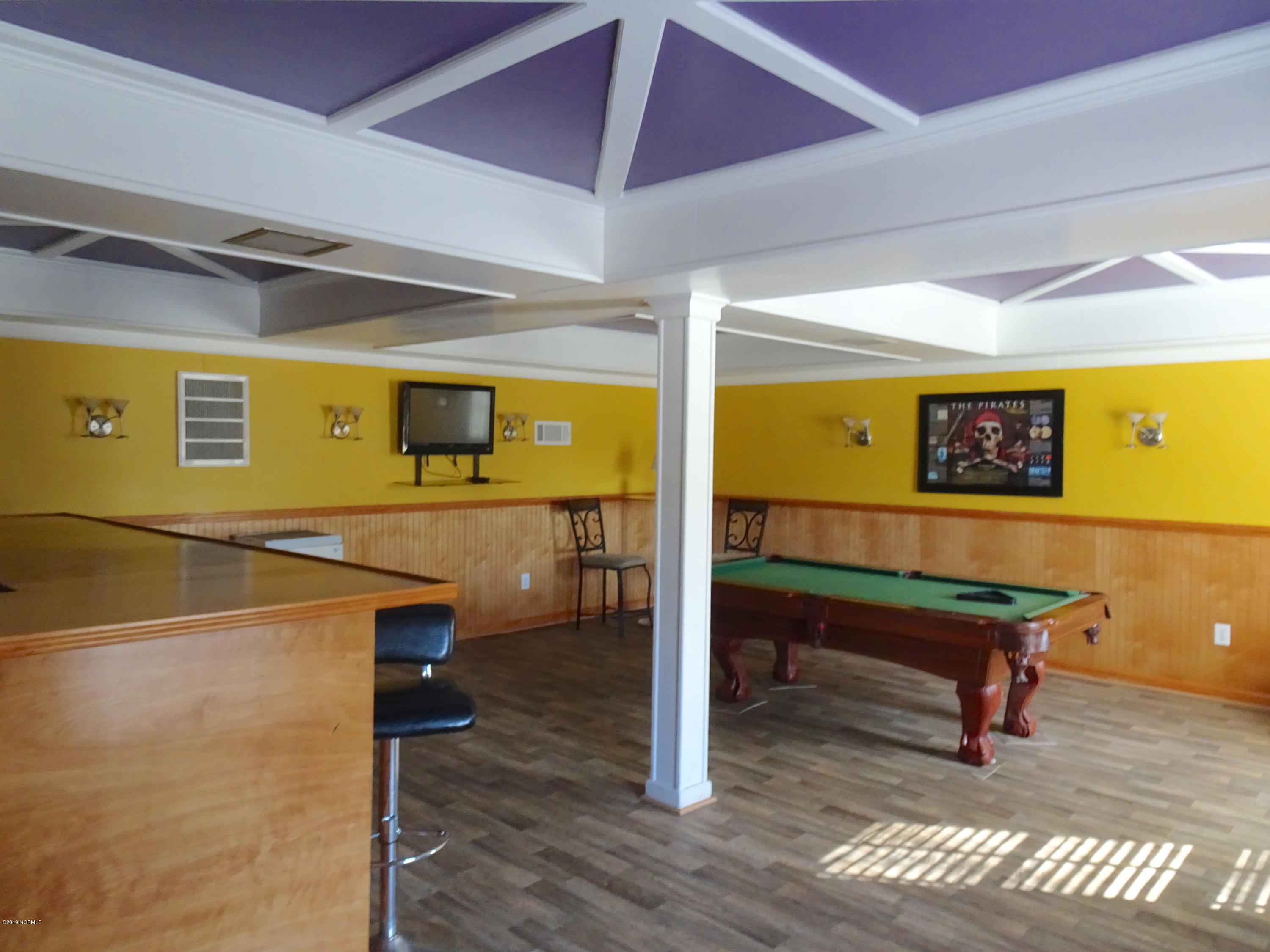 1106 West Rock Spring Road Greenville, NC 27858 - Photo 41 of 51 Basement Game Room/ Bar