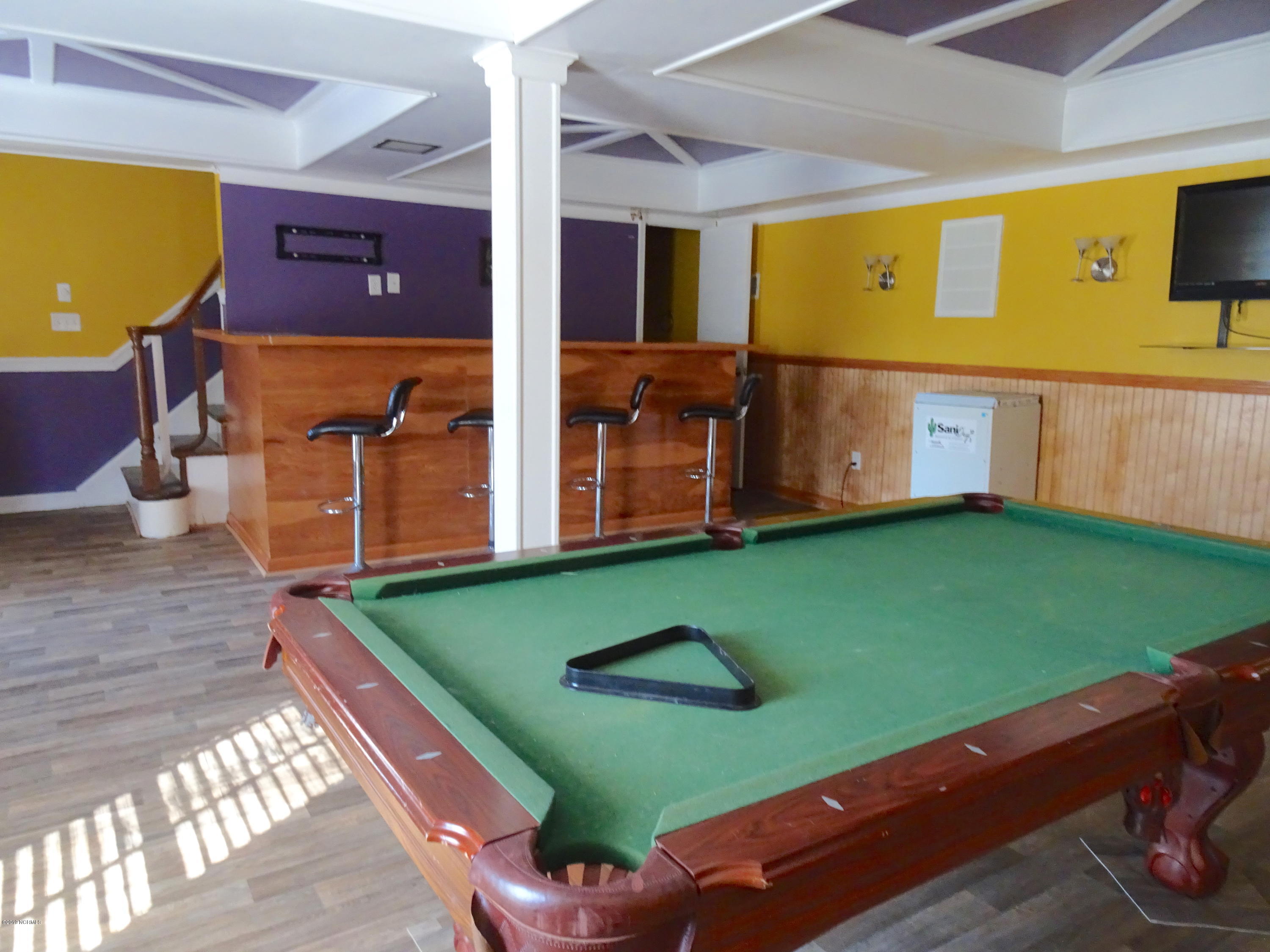 1106 West Rock Spring Road Greenville, NC 27858 - Photo 42 of 51 Basement Game Room / Bar