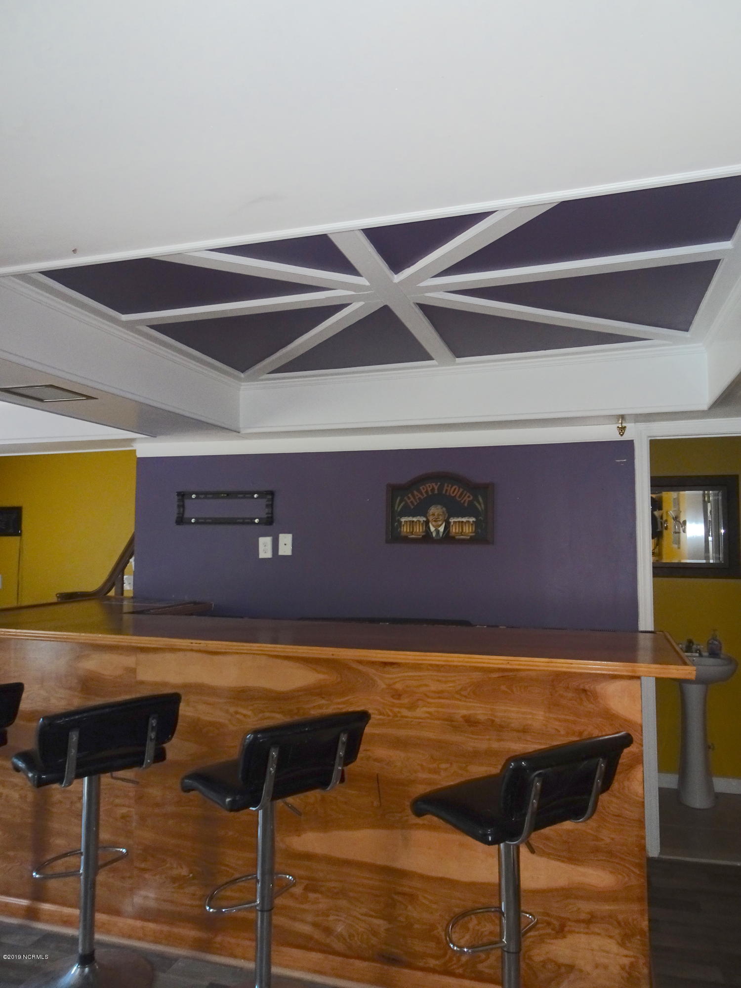1106 West Rock Spring Road Greenville, NC 27858 - Photo 43 of 51 Basement Game Room Bar