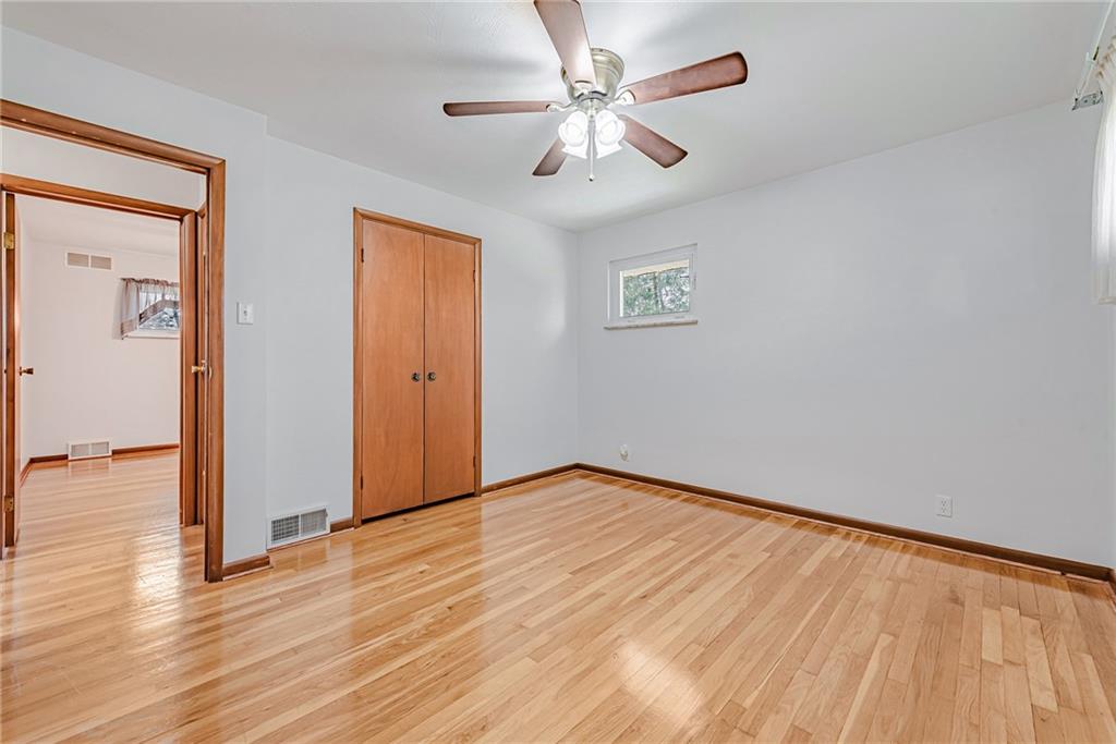 310 Longwood Drive Irwin, PA 15642 - Photo 17 of 25 a view of an empty room with wooden floor