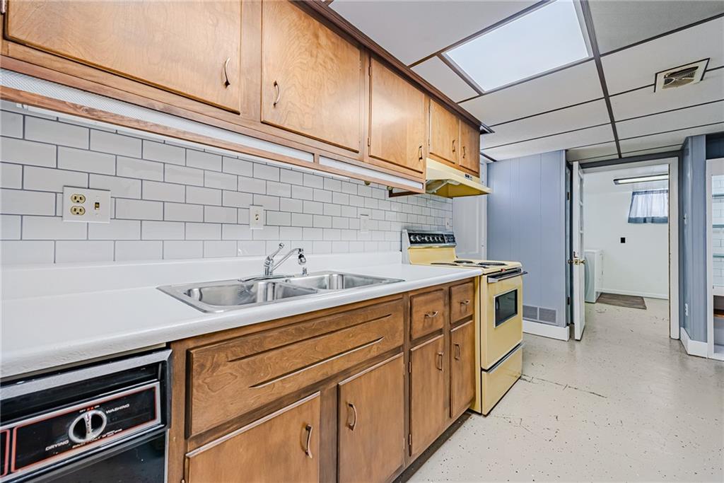 310 Longwood Drive Irwin, PA 15642 - Photo 23 of 25 a utility room with cabinets