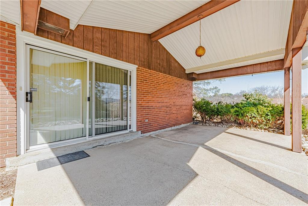 310 Longwood Drive Irwin, PA 15642 - Photo 9 of 25 a front view of a house with a garage