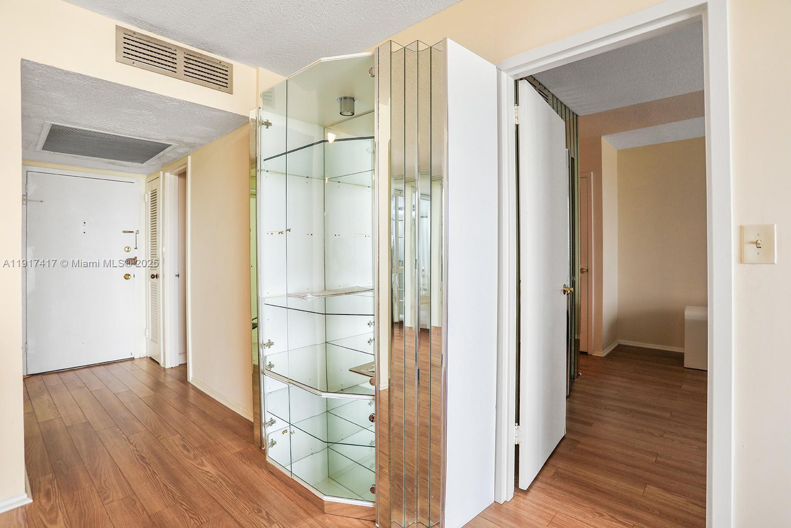 2030 South Ocean Drive, Unit 503 Hallandale Beach, FL 33009 - Photo 20 of 41 a view of a bathroom with wooden floor and a bathroom