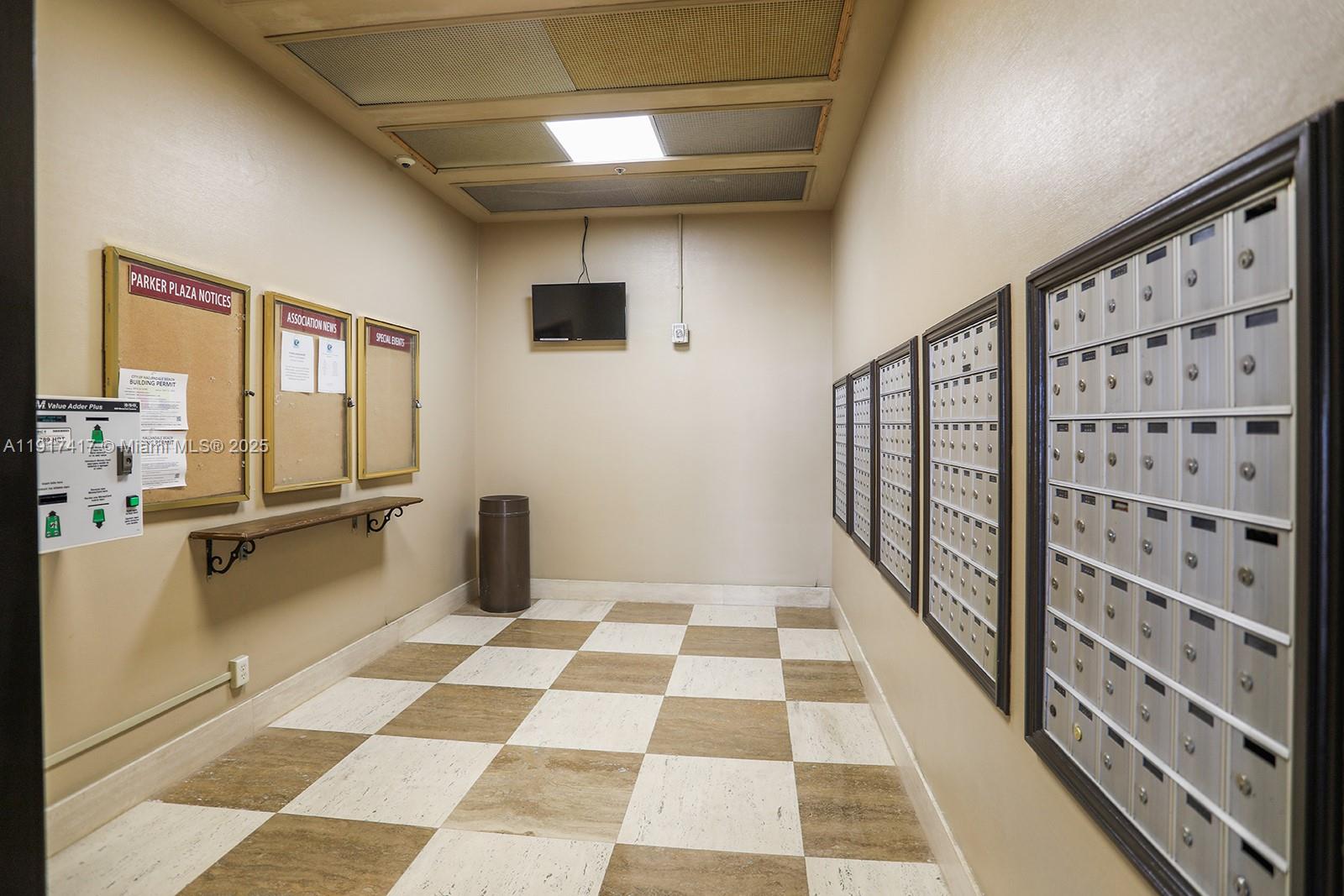 2030 South Ocean Drive, Unit 503 Hallandale Beach, FL 33009 - Photo 31 of 41 a view of a walk in closet with wooden floor and windows