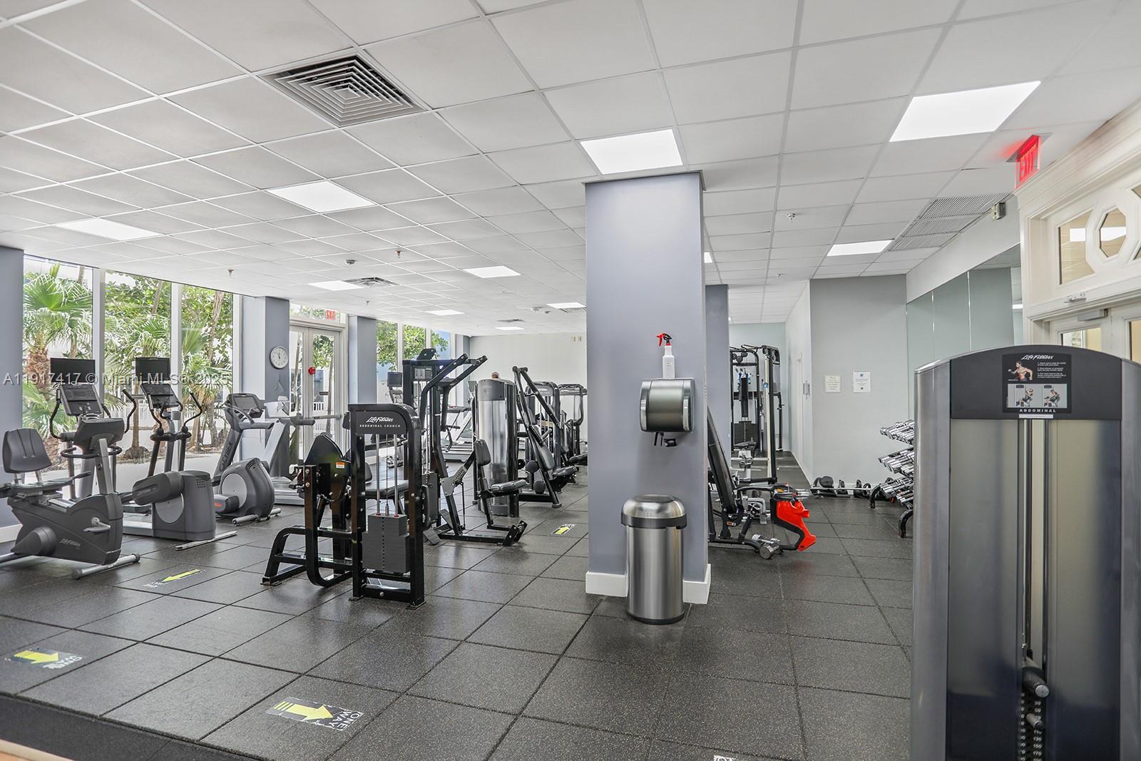 2030 South Ocean Drive, Unit 503 Hallandale Beach, FL 33009 - Photo 33 of 41 a gym room with lots of gym equipment