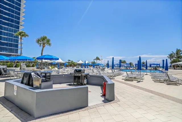 a view of a chairs and bench in the terrace