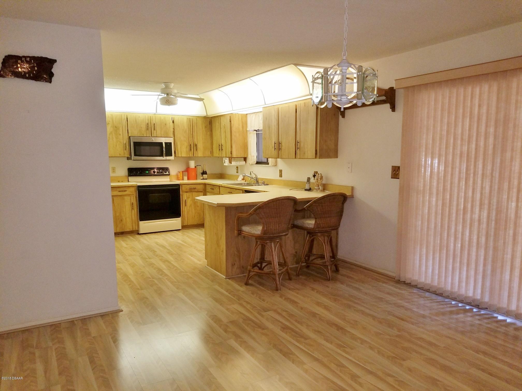 86 Crooked Pine Road Port Orange, FL 32128 - Photo 8 of 13 breakfast bar open to dining
