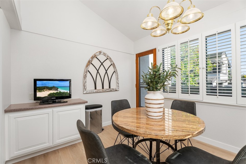 165 Old Ranch Road, Unit 3 Seal Beach, CA 90740 - Photo 15 of 31 Kitchen eating nook with an outdoor balcony