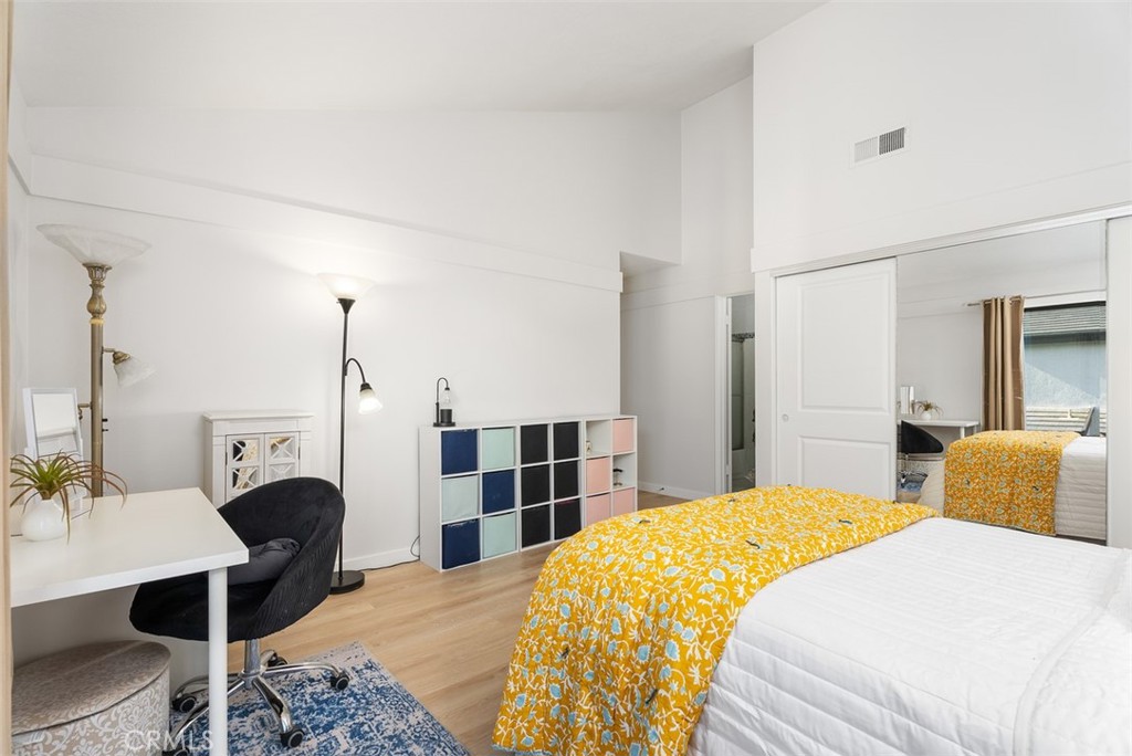 165 Old Ranch Road, Unit 3 Seal Beach, CA 90740 - Photo 23 of 31 Vaulted ceilings in secondary bedroom