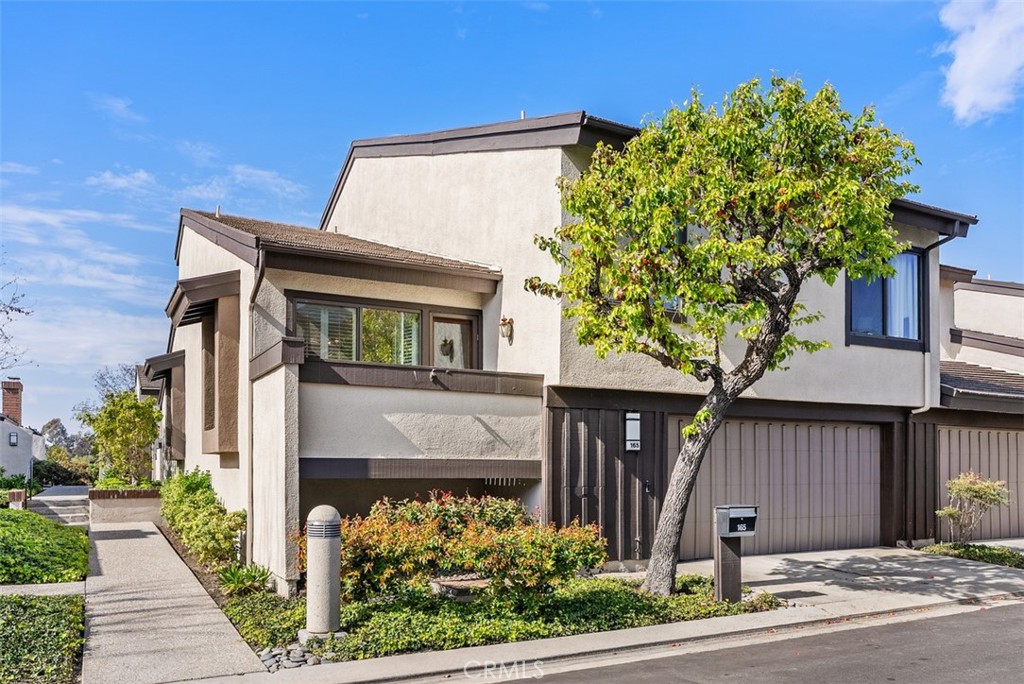 165 Old Ranch Road, Unit 3 Seal Beach, CA 90740 - Photo 31 of 31 Two car attached garage and balcony