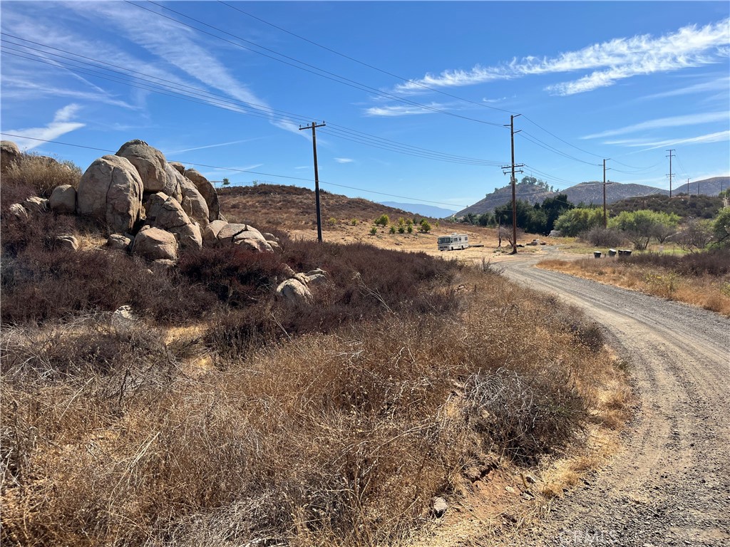 0 Menifee Road Murrieta, CA 92563 - Photo 7 of 20 a view of a dry yard with a tree