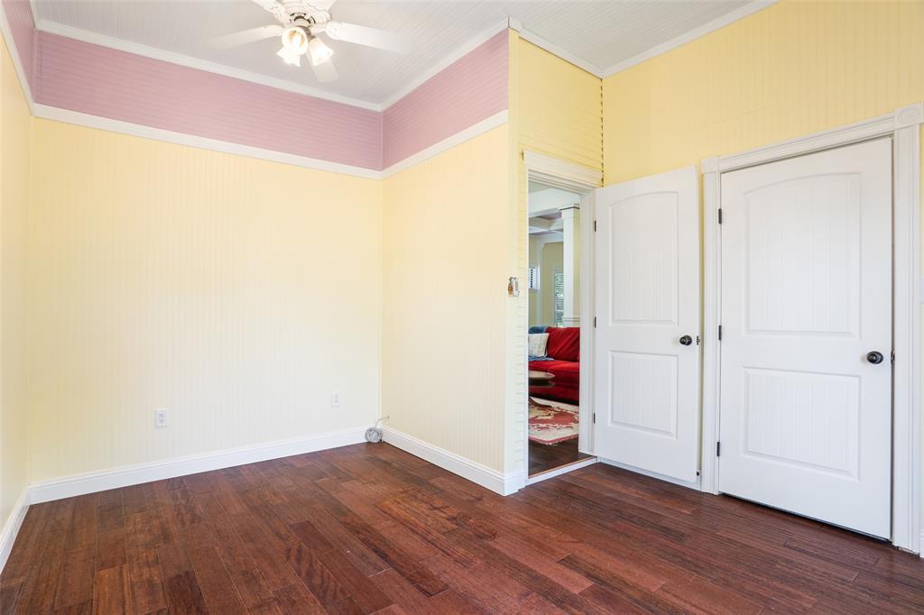 5824 Boone Street Sachse, TX 75048 - Photo 20 of 40 a view of an empty room with wooden floor