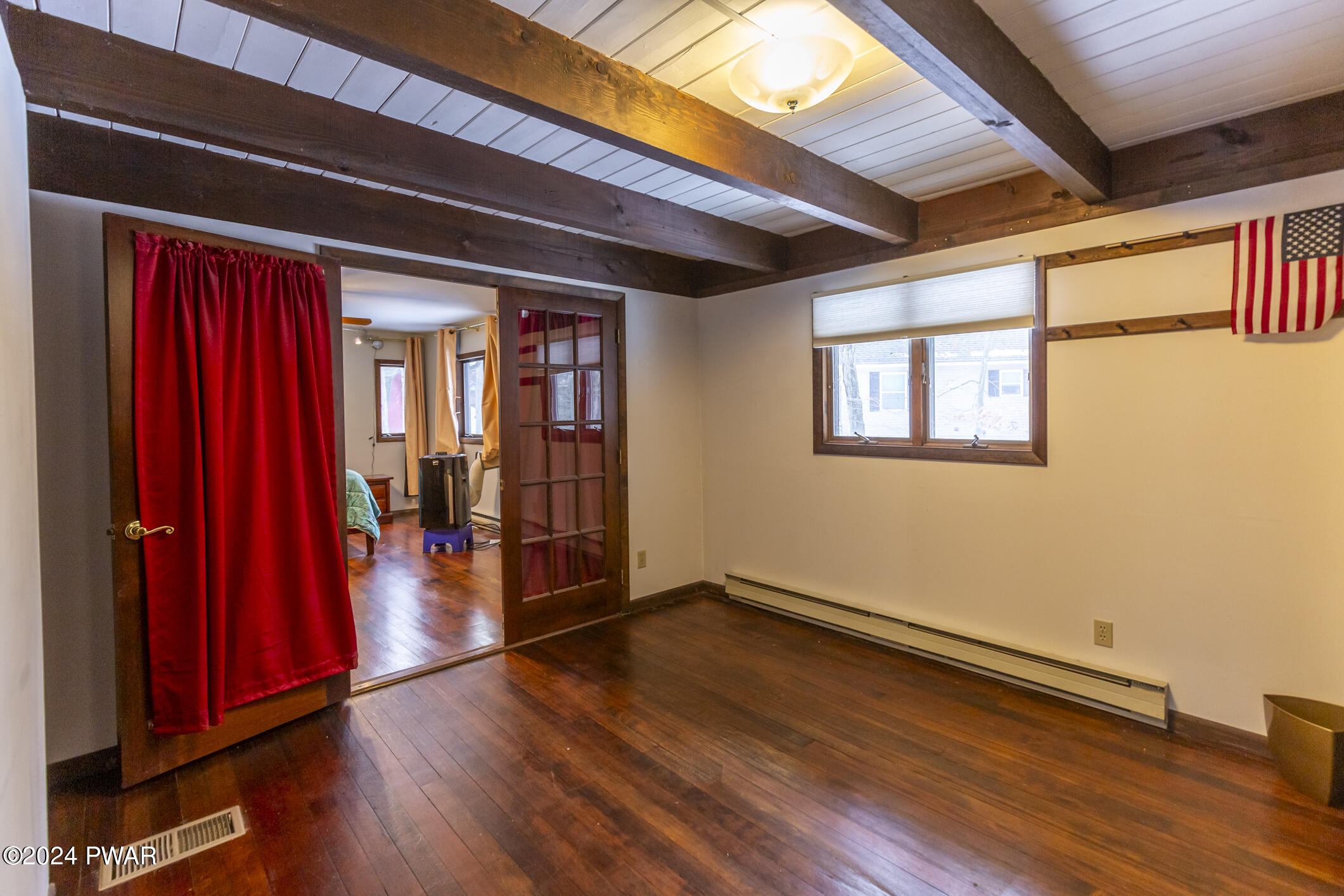 365 Northgate Road Lake Ariel, PA 18436 - Photo 29 of 68 a view of a room with wooden floor and stairs