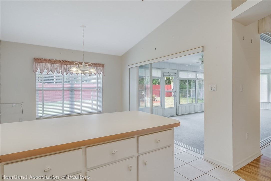 246 Tangerine Road Lake Placid, FL 33852 - Photo 15 of 36 a living room with furniture and a table