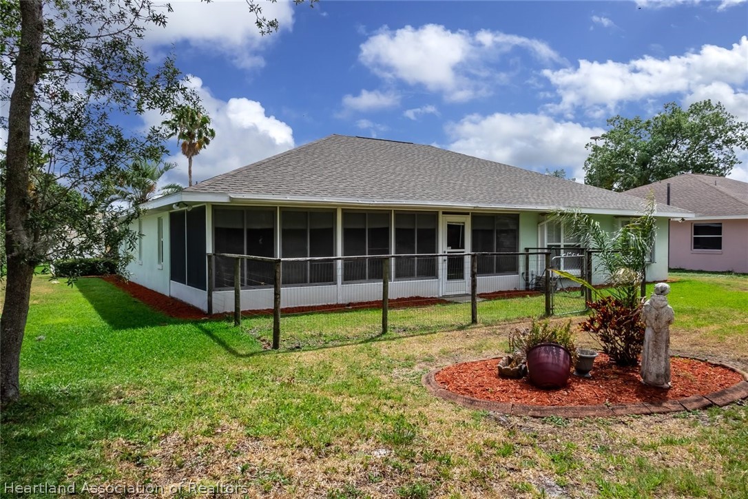 246 Tangerine Road Lake Placid, FL 33852 - Photo 32 of 36 a view of a house with yard and porch