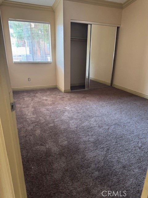 995 Margarita Drive, Unit F203 Corona, CA 92879 - Photo 7 of 12 a view of an empty room with a window