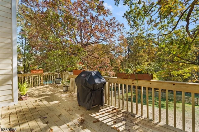 a view of balcony with wooden floor