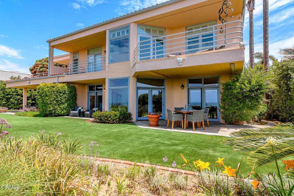 101 Rios Court Solana Beach, CA 92075 - Photo 44 of 67 a view of a house with a yard and sitting area