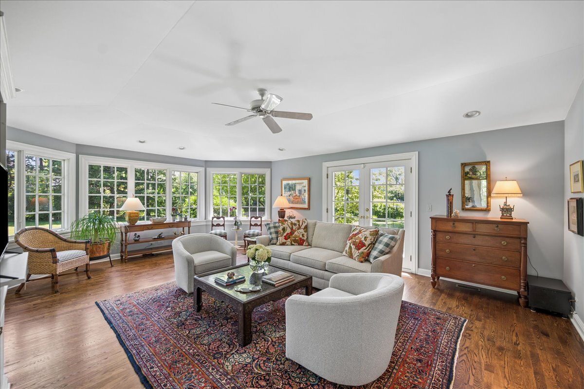 253 Summerfield Road Northbrook, IL 60062 - Photo 20 of 46 a living room with furniture and a large window