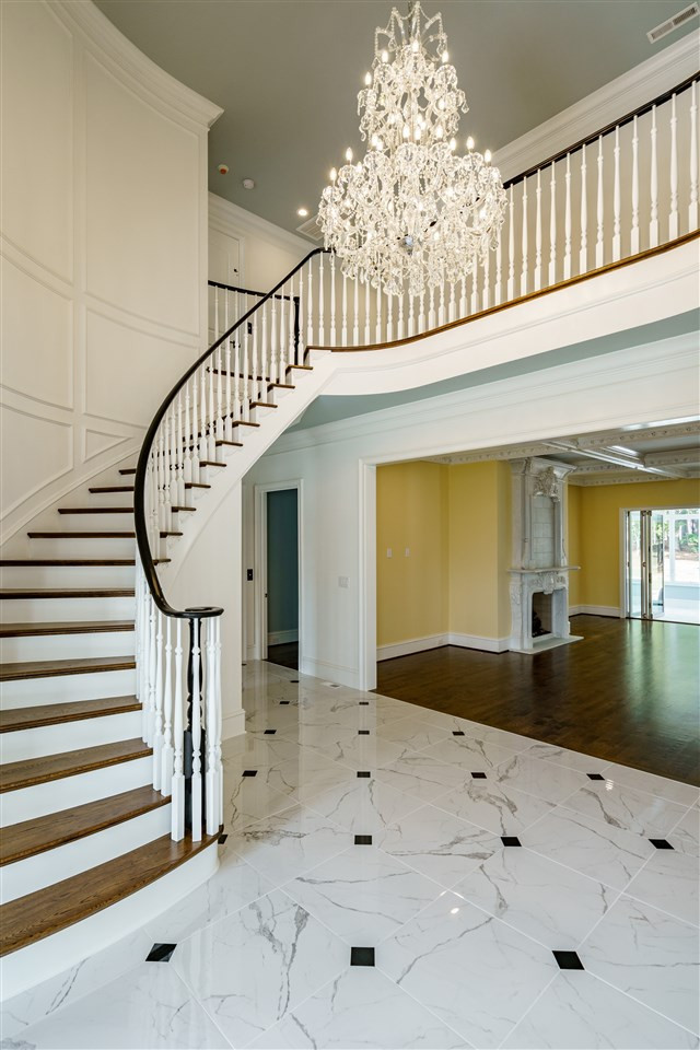 6505 Century Oak Court Raleigh, NC 27613 - Photo 4 of 30 Breathtaking Curved Staircase with Balcony Overlook