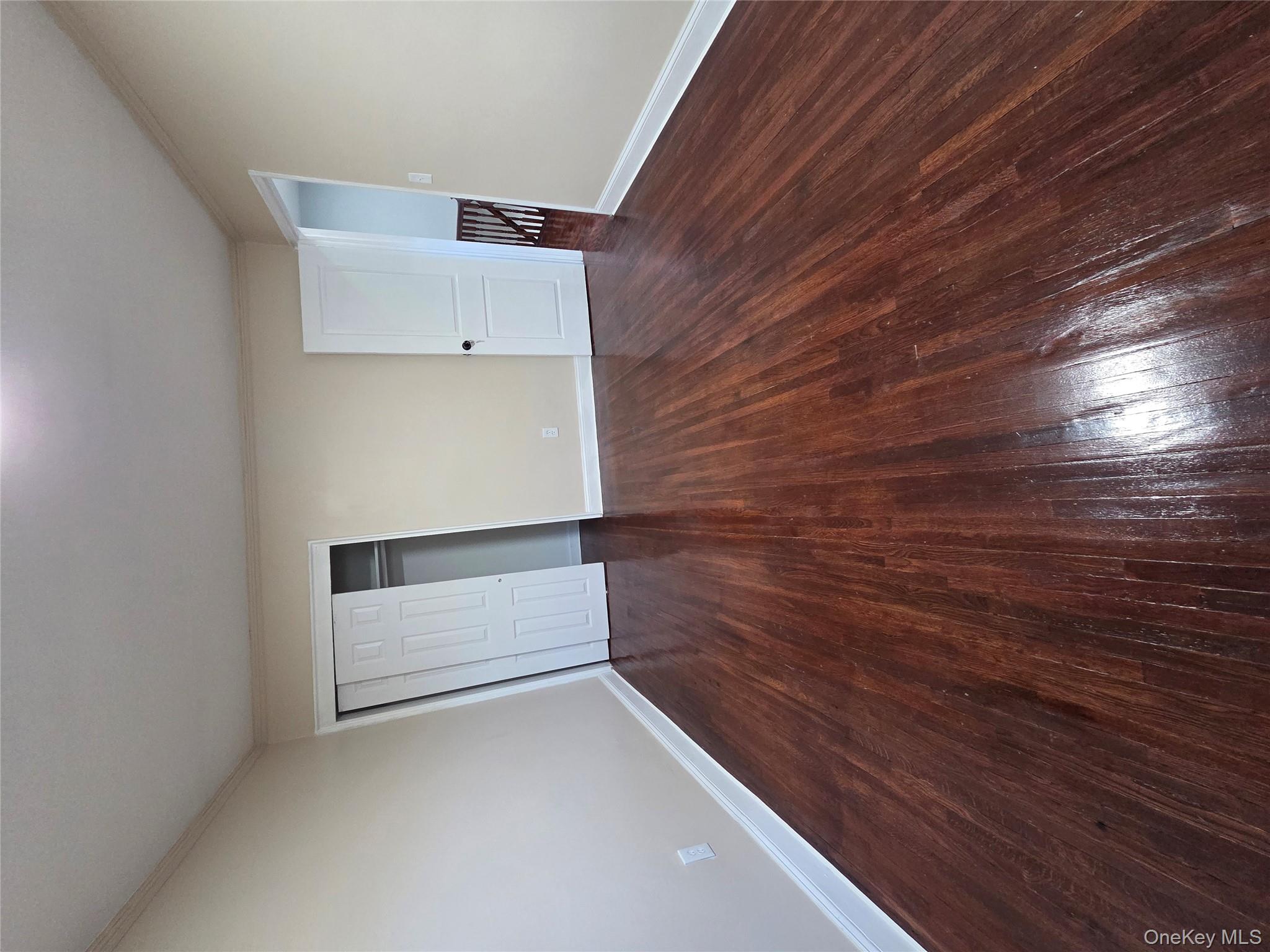 4160 Baychester Avenue Bronx, NY 10466 - Photo 12 of 24 a view of empty room with wooden floor